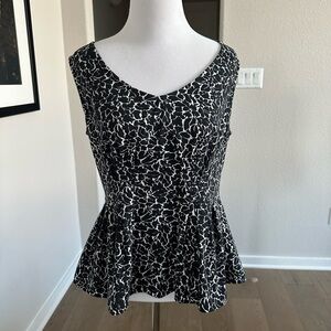 Deletta from Anthropologie peplum black and white top